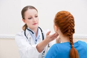 Endocrinologist Examing Patient